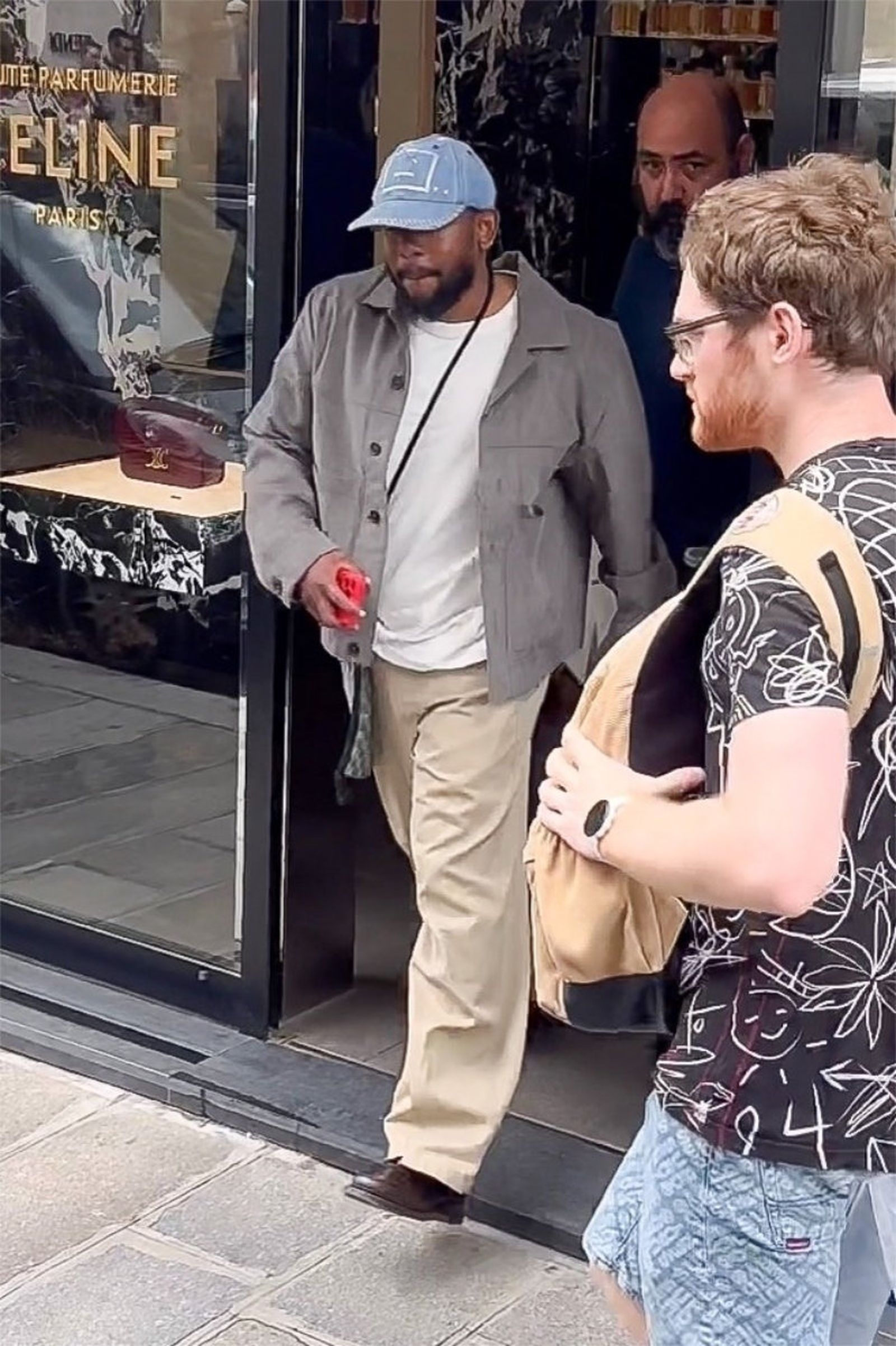 *EXCLUSIVE* Kendrick Lamar exits the Celine Perfume store while shopping in Paris