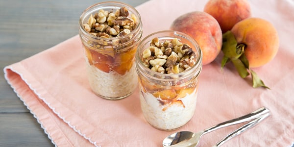 Nutty Peaches and Cream Overnight Oats in a Mason Jar