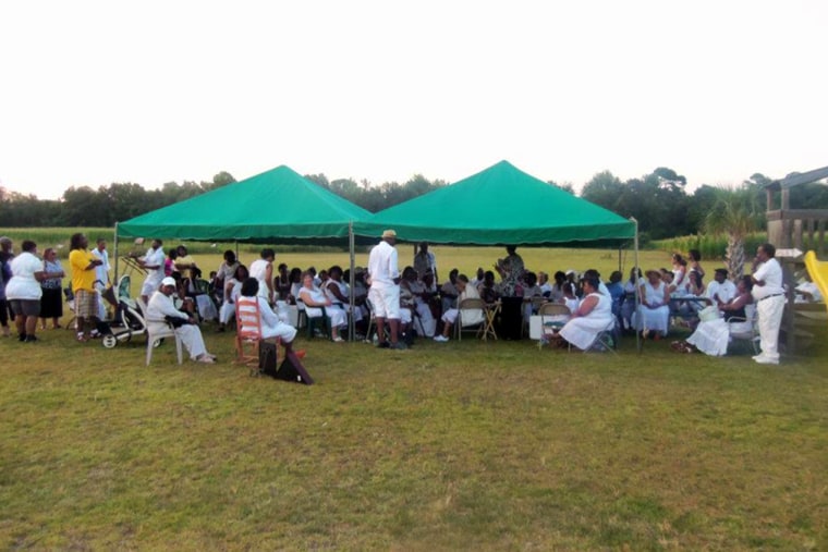 Evelyn Booker's extended family gathers regularly on land passed down for generations.