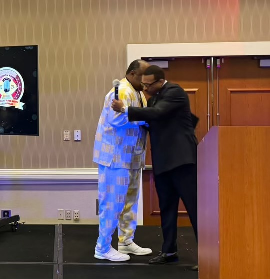 Photo taken at the National Black Radio Hall of Fame convention. Left to right: Roland Martin and Dr. Rashad Richey.